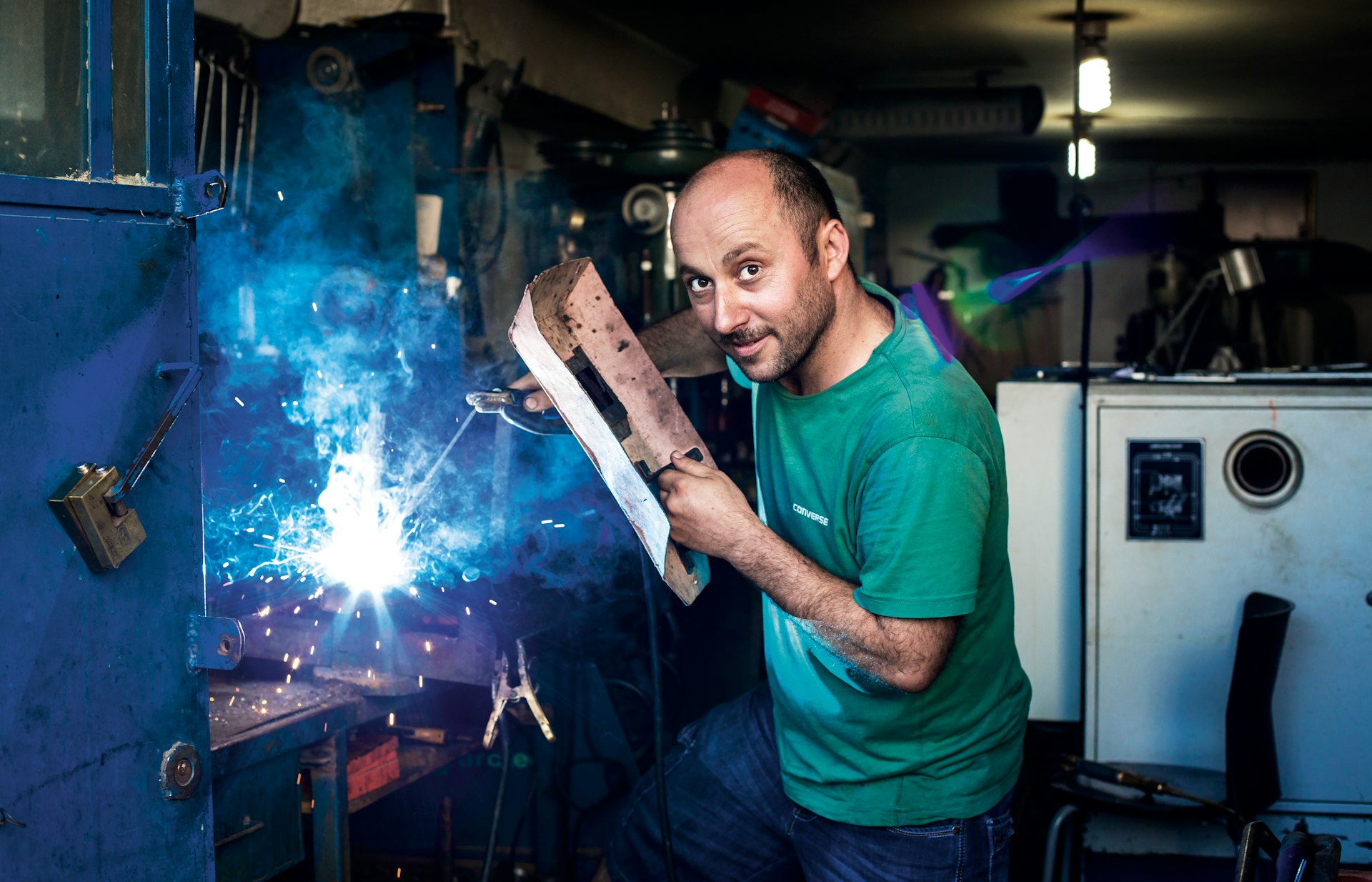 man holding welding mask